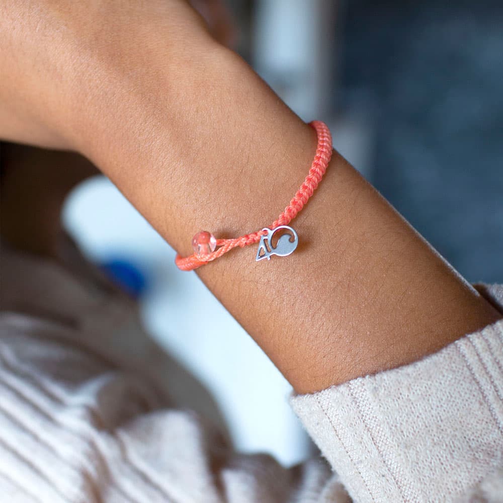 A Person Wearing the 4ocean Albatross Braided Bracelet
