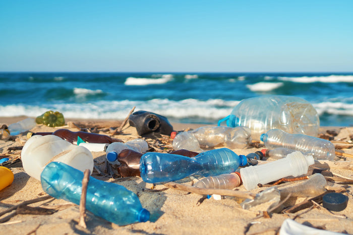 Plastic pollution from the ocean covering the beach