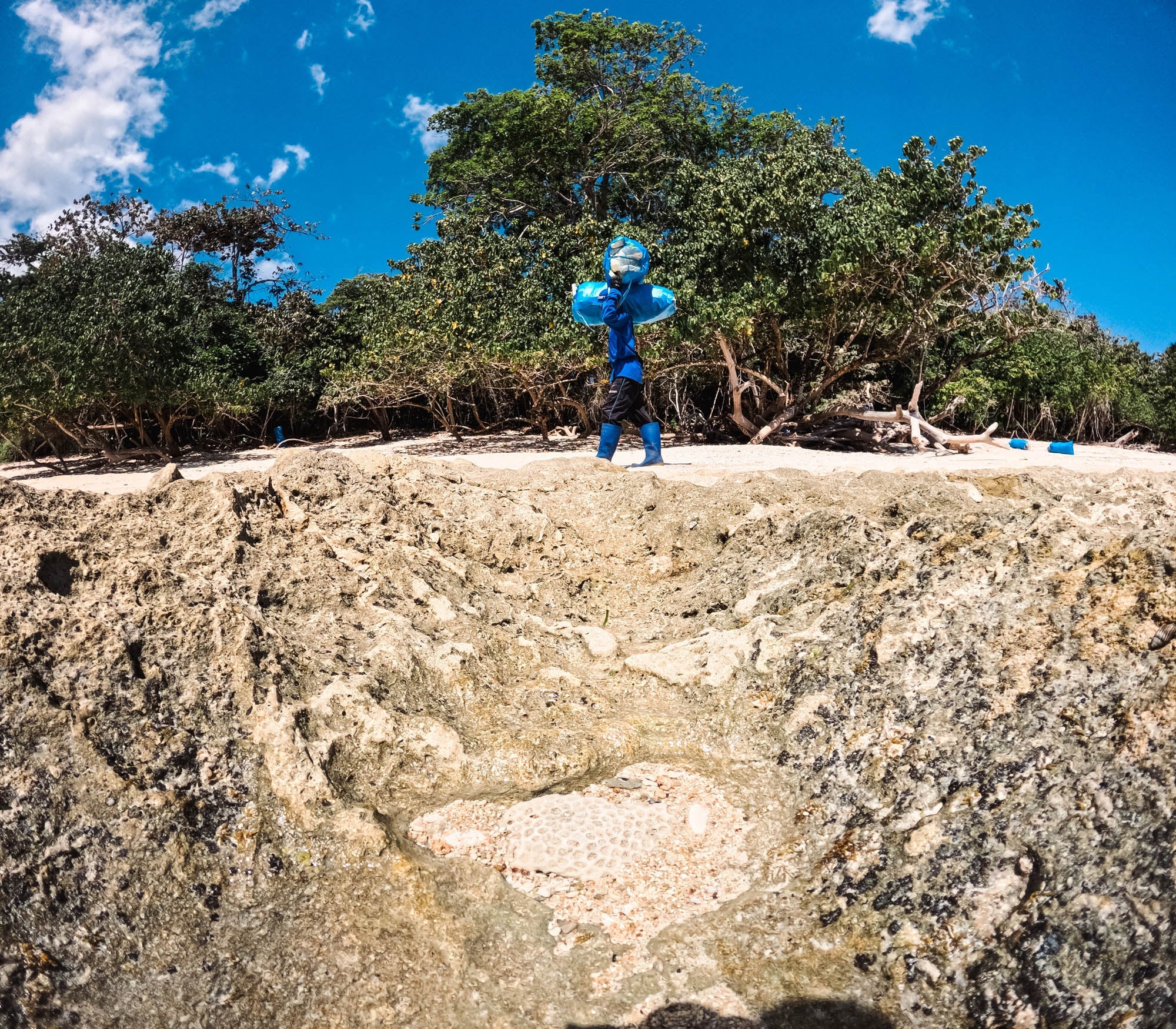 Cleaning Up What the Tides Left Behind at G-Land Beach