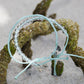 Olive Ridley Sea Turtle Beaded and Braided Bracelets on the beach