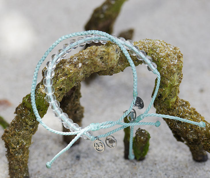 Olive Ridley Sea Turtle Beaded and Braided Bracelets on the beach