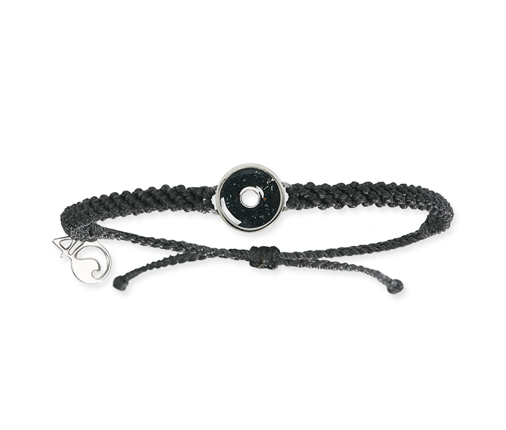 This black macrame bracelet is hand braided using 100% recycled plastic cord. Designed to represent the tires we’re recovering from the Osborne Reef, the tire-shaped bezel is filled with verified 100% crumb rubber from tires that our crews recovered directly from the Osborne Reef