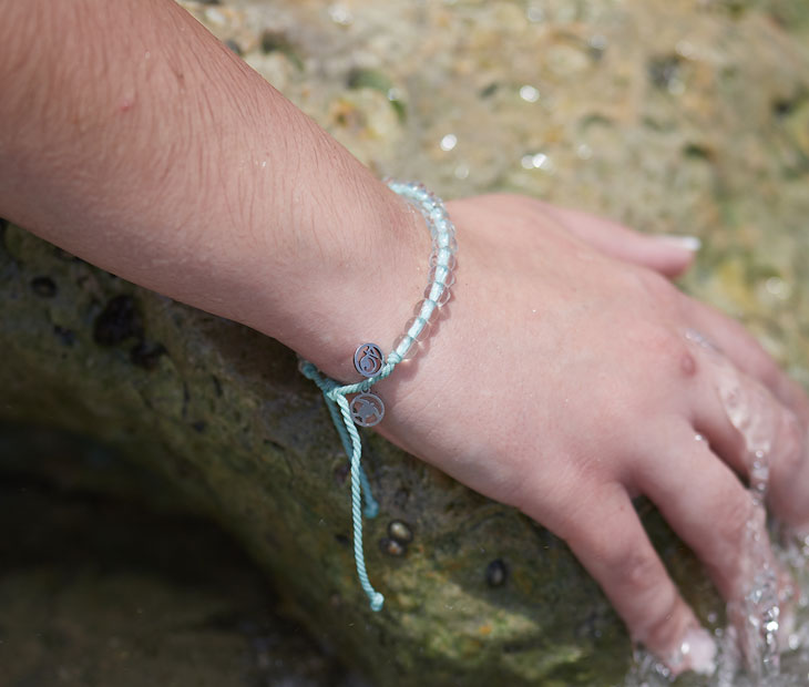 Olive Ridley Sea Turtle Beaded Bracelet on a female model.