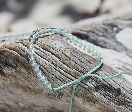 Olive Ridley Sea Turtle Beaded Bracelet on drift wood.