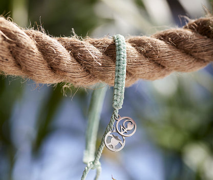 Olive Ridley Braided Bracelet on a rope.