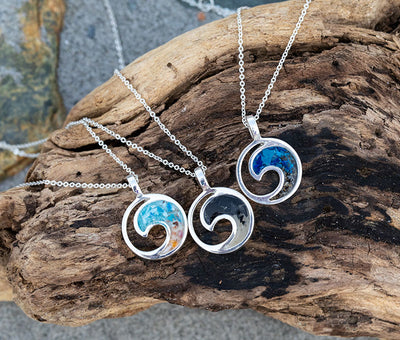 Set of 3 Dune Wave Necklaces on a plank of driftwood