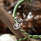4ocean Earth Day Braided Bracelet 2022 - green. Closeup.