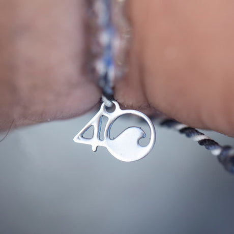 4ocean Great White Shark Beaded Bracelet on a men's wrist