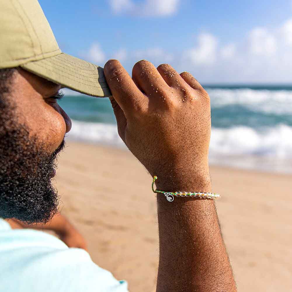 A Person Wearing the 4ocean Sea Star Starfish Beaded Bracelet