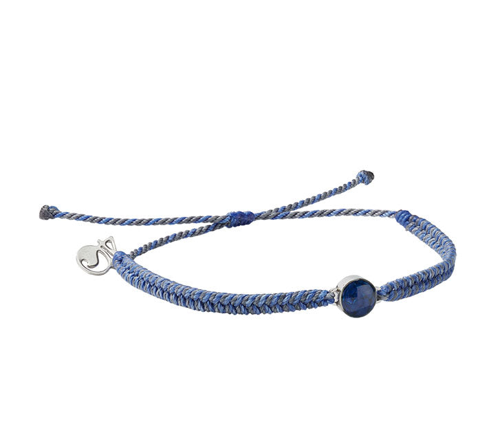 4Ocean Ocean Drop Bracelet. Black and blue braided cord with stainless and blue bezel. 
