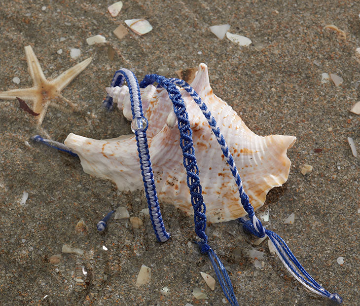 Ocean Bracelet Stack on a seashell
