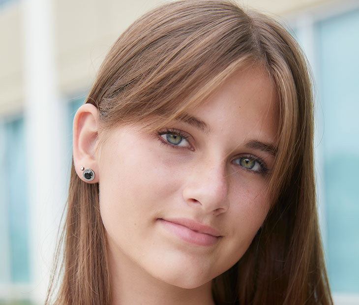 Osborne Reef Stud Earrings - on female model.