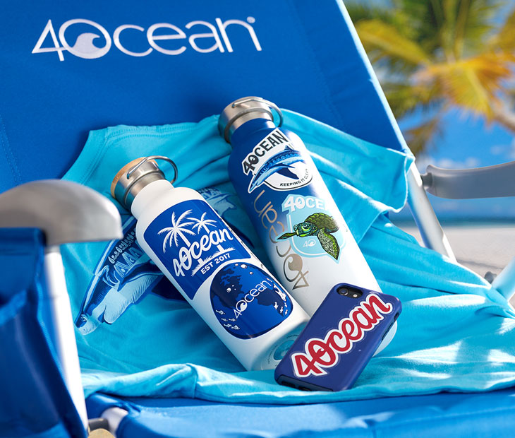 Two 4ocean reusable bottles with 4ocean stickers on them