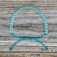 4ocean White-Sided Dolphin Beaded Bracelet on a wooden plank